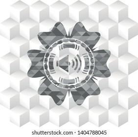 sound icon inside grey emblem with cube white background