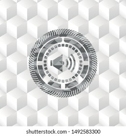 sound icon inside grey emblem. Vintage with geometric cube white background
