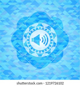 sound icon inside light blue mosaic emblem