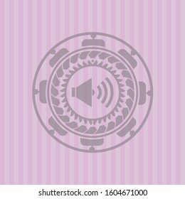 sound icon inside pink emblem