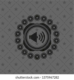sound icon inside realistic dark emblem