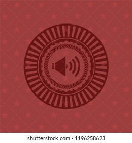 sound icon inside realistic red emblem