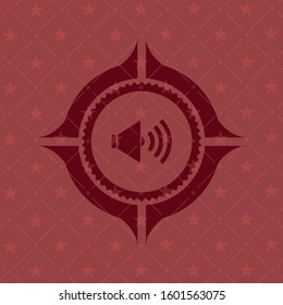 sound icon inside realistic red emblem
