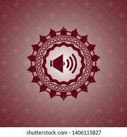 sound icon inside red emblem