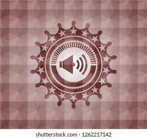 sound icon inside red seamless emblem with geometric pattern background.