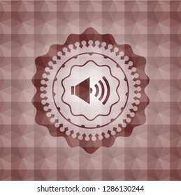 sound icon inside red seamless emblem or badge with abstract geometric polygonal pattern background.