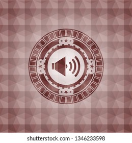 sound icon inside red seamless badge with geometric pattern.
