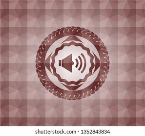 sound icon inside red seamless badge with geometric pattern background.