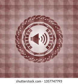 sound icon inside red seamless geometric badge.