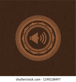 sound icon inside retro style wood emblem