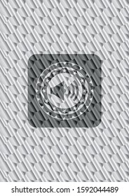 sound icon inside shiny silver badge. Scales pattern. Vector Illustration. Detailed.