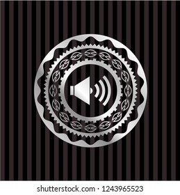 sound icon inside silver badge