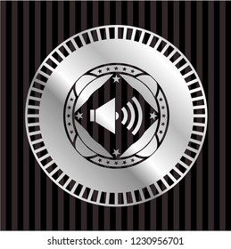 sound icon inside silvery emblem or badge