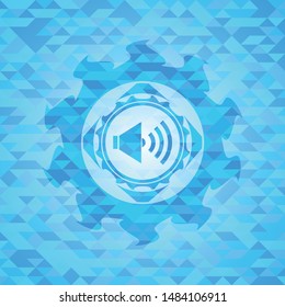 sound icon inside sky blue emblem with triangle mosaic background