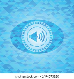 sound icon inside sky blue mosaic emblem