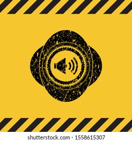 sound icon inside warning sign, black grunge emblem. Vector Illustration. Detailed.
