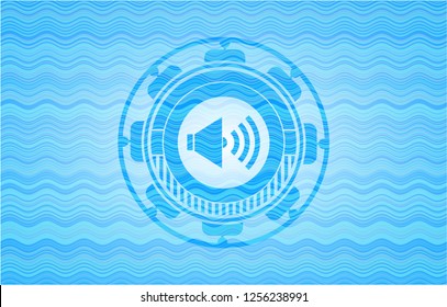 sound icon inside water concept emblem background.