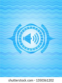 sound icon inside water concept badge background.