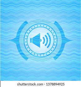 sound icon inside water wave representation badge.