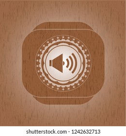 sound icon inside wood badge or emblem