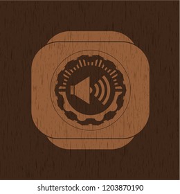 sound icon inside wood emblem