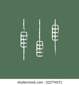 Sound mixer console hand drawn in chalk on a blackboard vector white icon isolated on a green background.