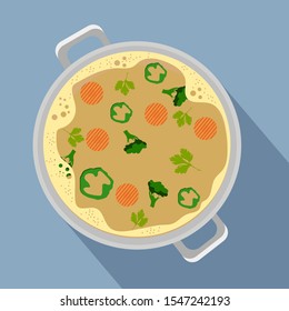 Soup with broccoli and herbs top view