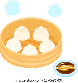 Soup dumplings and sauce with ginger slices