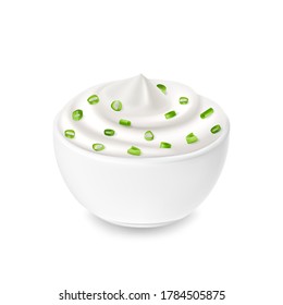 Sour cream sauce in white bowl, tartar, green onion and sour cream flavor, mayonnaise. Tasty food.