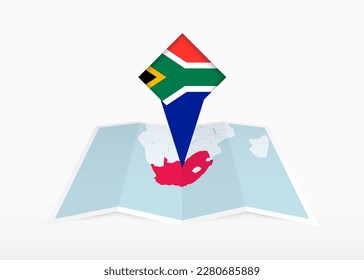 South Africa is depicted on a folded paper map and pinned location marker with flag of South Africa. Folded vector map.