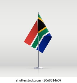 Símbolo del estado de la bandera de Sudáfrica aislado en una bandera nacional de fondo. Tarjeta de saludo Día Nacional de la Independencia de la República de Sudáfrica. Banner de ilustración con bandera de estado realista de RSA.