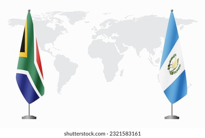 South Africa and Guatemala flags for official meeting against background of world map.