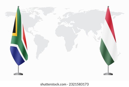 South Africa and Hungary flags for official meeting against background of world map.