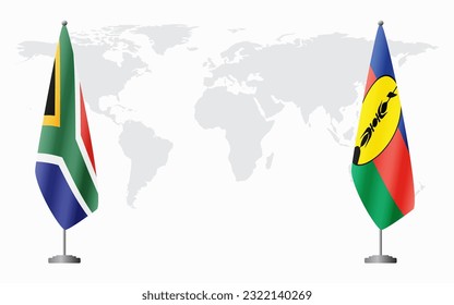 South Africa and New Caledonia flags for official meeting against background of world map.