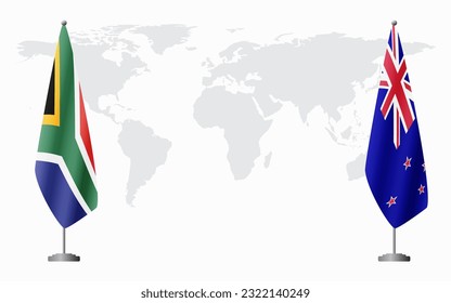 South Africa and New Zealand flags for official meeting against background of world map.