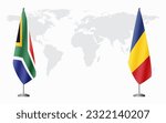 South Africa and Romania flags for official meeting against background of world map.