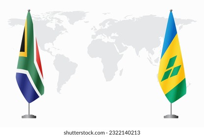 South Africa and Saint Vincent and the Grenadines flags for official meeting against background of world map.