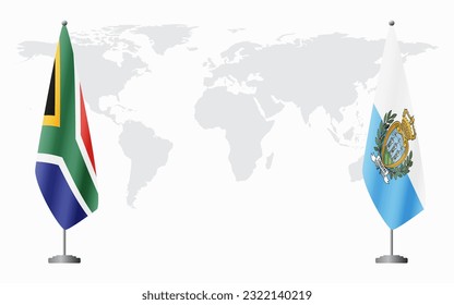 South Africa and San Marino flags for official meeting against background of world map.