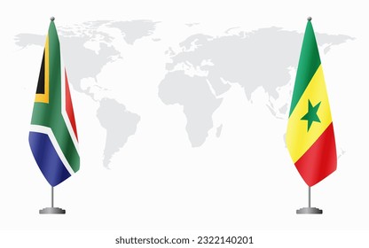 South Africa and Senegal flags for official meeting against background of world map.
