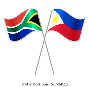 South African and Filipino crossed flags. South Africa combined with Philippines isolated on white. Language learning, international business or travel concept.