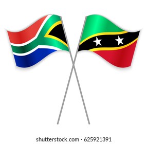 South African and Kittitian crossed flags. South Africa combined with Saint Kitts and Nevis isolated on white. Language learning, international business or travel concept.