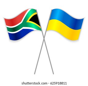 South African and Ukrainian crossed flags. South Africa combined with Ukraine isolated on white. Language learning, international business or travel concept.