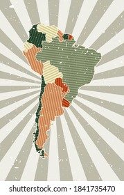 South America vintage map. Grunge poster with map of the continent in retro color palette. Shape of South America with sunburst rays background. Vector illustration.