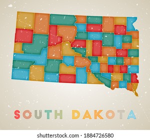 South Dakota map. US state poster with colored regions. Old grunge texture. Vector illustration of South Dakota with US state name.