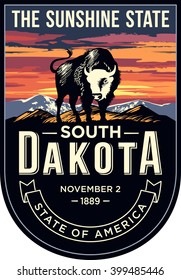 South Dakota state emblem, sunset on a dark background