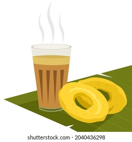 South Indian style tea with vada on banana leaf