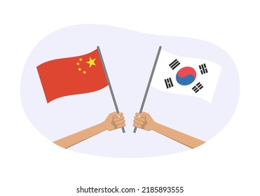 Banderas de Corea del Sur y China. Símbolos chinos y coreanos. Mano sosteniendo la bandera ondeando. Ilustración vectorial.