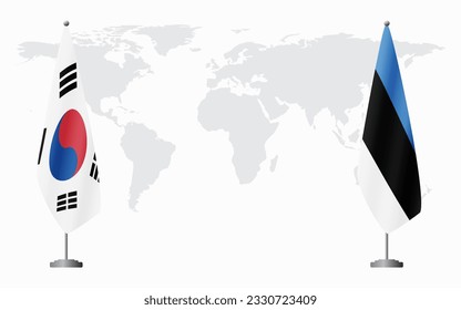 South Korea and Estonia flags for official meeting against background of world map.
