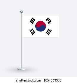 South Korea flag. The national flag of South Korea on a pole. The waving flag. The sign and symbol of the country. Realistic vector on white.