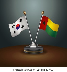 South Korea  and Guinea Bissau table flags relation with gradient backgrund. Vector Illustration